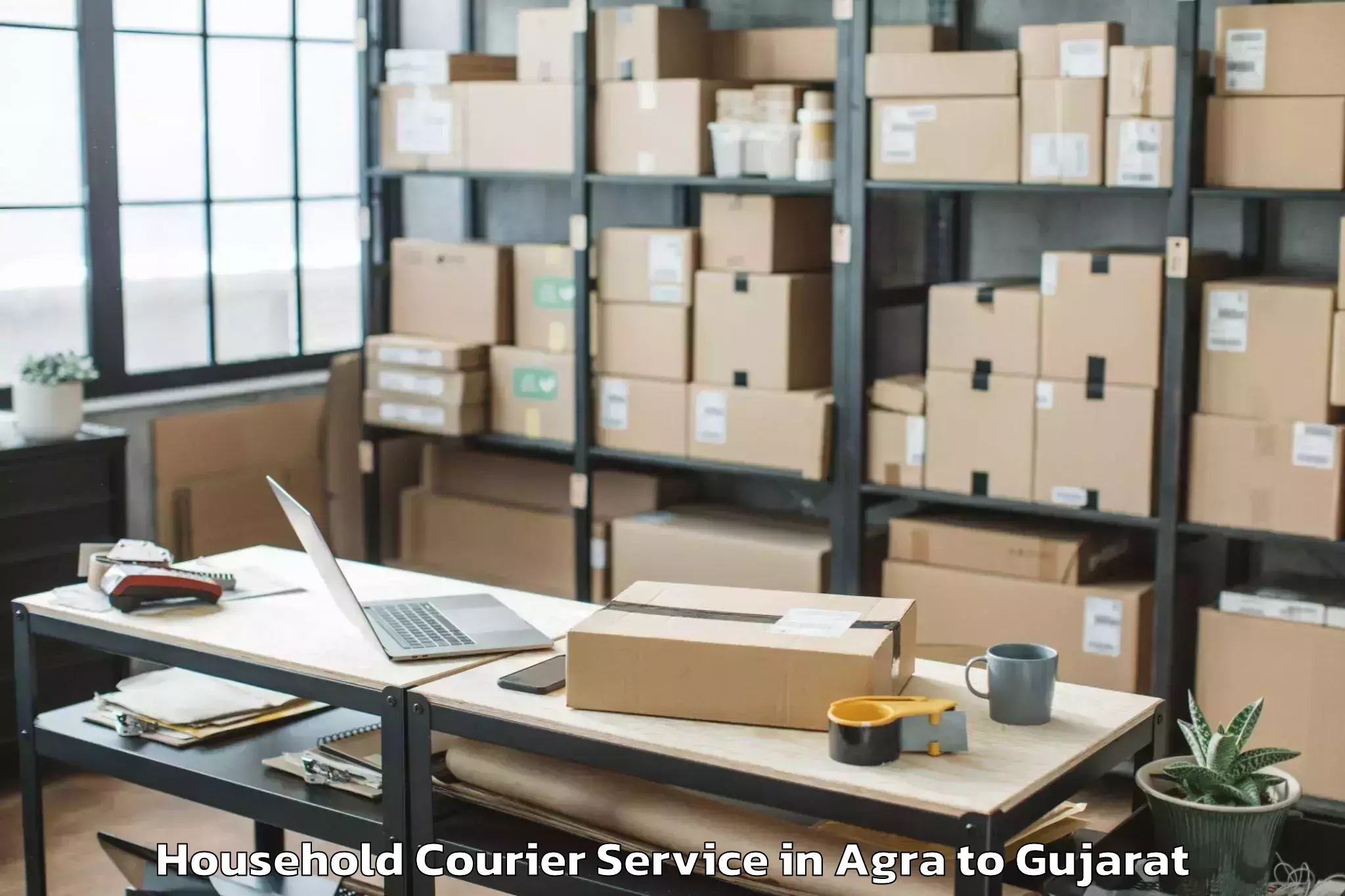 Reliable Agra to Udhana Household Courier